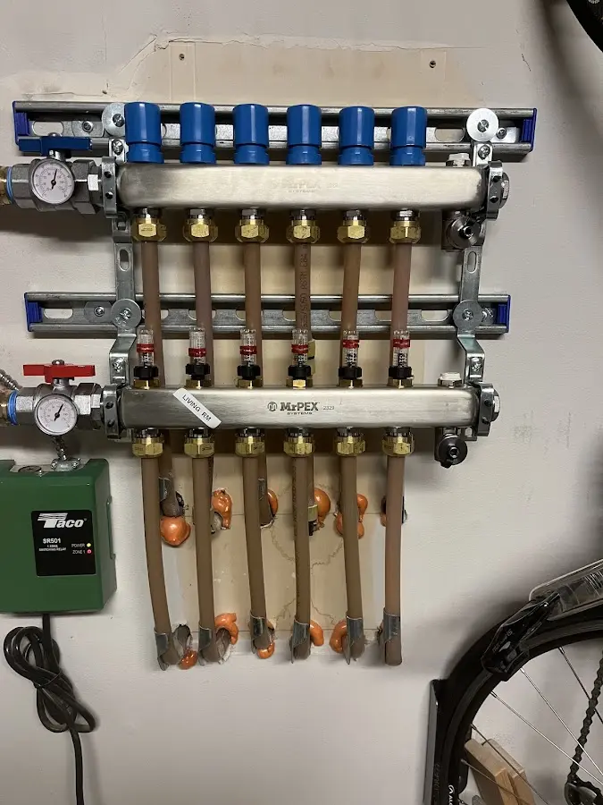 Plumber performing Water Heater Repair at a residential property in Inver Grove Heights